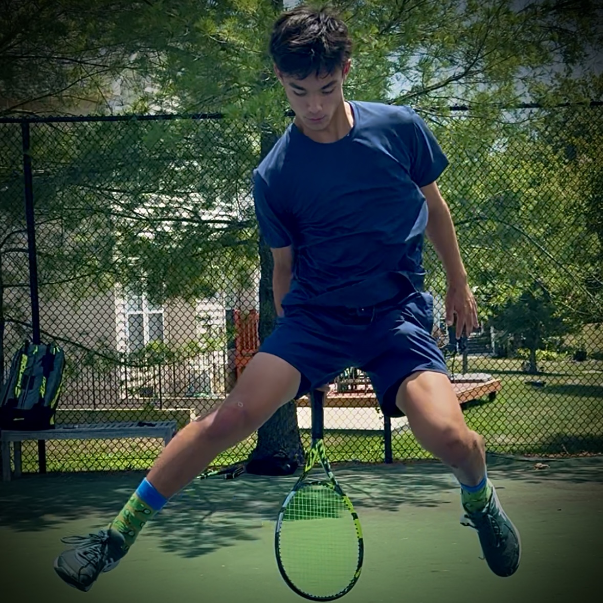 Judah mid-air during a between-the-legs trick shot