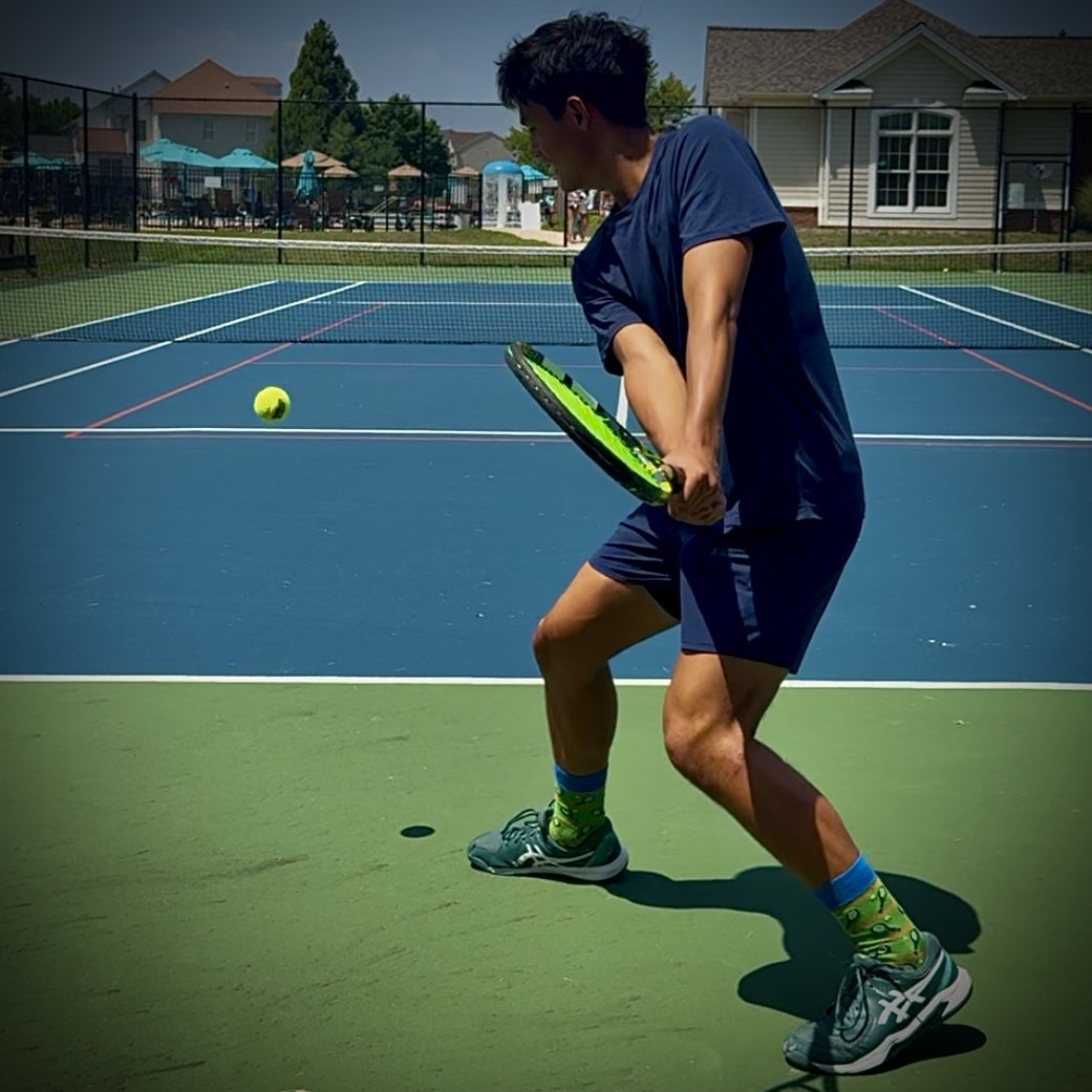 Judah driving through a two-handed backhand